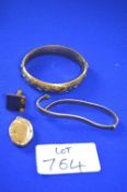 Rolled Gold Items Including Two Bangles, a Locket, and a Cufflink