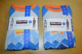 Two Kirkland Kid’s 4pc Pyjama Sets Size: 7 years