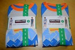 Two Kirkland Kid’s 4pc Pyjama Sets Size: 8 years