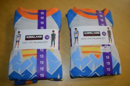 Two Kirkland Kid’s 4pc Pyjama Sets Size: 10 years