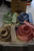 *Two Plastic Dinnerware Sets