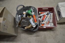 *A Bucket and a Box of Assorted Silicones and Sealants