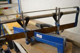 *Two Shovels, Plaster's Hawk Board, and a Table Mitre Saw