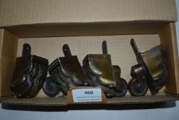 Four Brass Furniture Castors with Claw Feat
