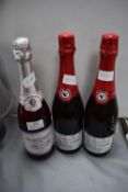 Three Bottles of Sparkling Wine