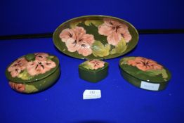 Four Moorcroft Hibiscus Pattern Lidded Pots and Di