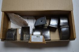 Eight Brass Castor Covers