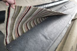 400cm wide Roll of Grey, Green, and Red Stripe Carpet