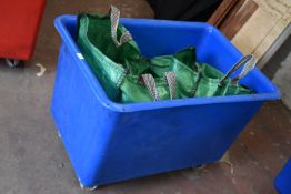 *Blue Plastic Laundry Basket and Two Bags of Assorted Tablecloths