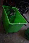 *Green Plastic Laundry Basket and Assorted Tablecloths