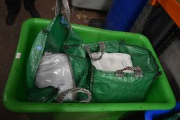 *Green Plastic Laundry Basket on Wheels with Two Bags of Clean Tablecloths 70x108” and 300cm round