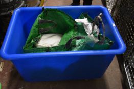 *Green Plastic Laundry Basket Containing Clean 35”x35” and 70x70” Tablecloths and Napkins