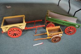 Three Hand Built Painted Wooden Horse Drawn Wagons