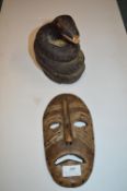 Carved Wooden Snake and a Face Mask