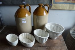Two Stoneware Flagons and Four Jelly Moulds
