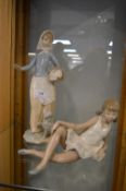 Two Nao Figurines of a Girl with a Puppy, and a Ba