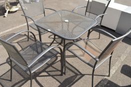 *Steel Mesh Patio Table and Four Stacking Chairs
