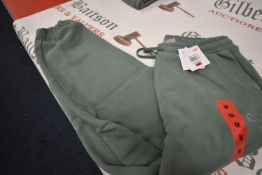 *Puma Light Green Joggers Size: M