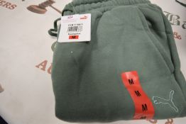 *Puma Light Green Joggers Size: M