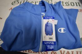 Champion Child’s Light Blue Hoodie Size: 11-12 years