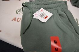 *Puma Light Green Joggers Size: M
