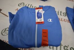Champion Child’s Light Blue Hoodie Size: 9-10 years