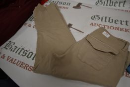 *Well Worn Lady’s Tan Trousers Size: 16