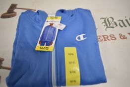 Champion Child’s Light Blue Hoodie Size: 7-8 years
