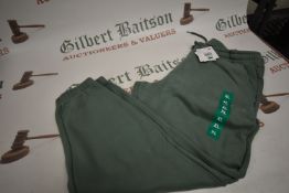 *Puma Light Green Joggers Size: XL