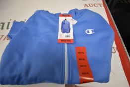 Champion Child’s Light Blue Hoodie Size: 9-10 years