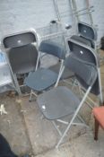 Six Folding Chairs