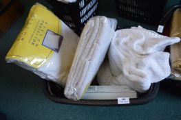 Basket of Towels, Pillow Protectors, and Digital S