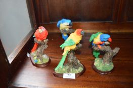 Four Parrot Figures