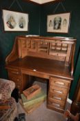 1930’s Oak Roll Top Desk with Eight Drawers, Pigeonholes, Original Lock & Key, and S-Shaped Closure