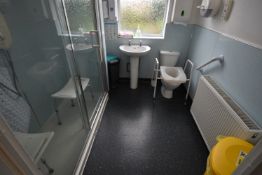 *Clinical Wastebin, Shower Stool, Wastebin, and a Toilet Riser