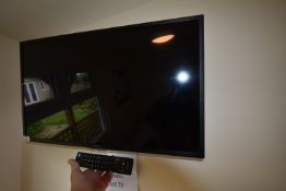 *Wall Mounted Technika TV with Remote