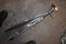 * Two Walking Stick Umbrellas