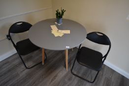 *Circular Table with Grey Top on Four Beech Legs, and Two Folding Chairs