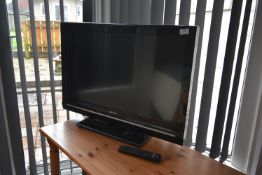 *Sharp Flatscreen TV with Remote Control