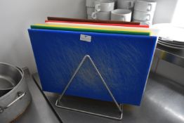 *Seven Coloured Chopping Boards In Stainless Steel Rack