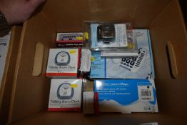 * Box Containing Talking Alarm Clock, Outdoor Key Safe, Portable Telephone Amplifier, etc.