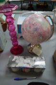 Fragrance Candles, Candlestick, and a Globe
