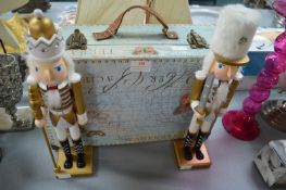 Two Wooden Nutcrackers and a Decorative Case