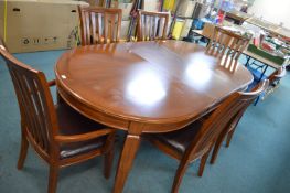 Oval Extending Dining Table with Dining Chairs and