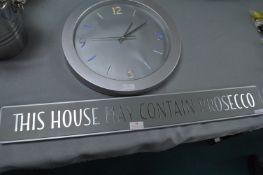 Prosecco Sign and a Wall Clock