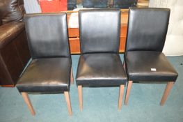 Three Vinyl Covered Side Chair