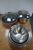 Stainless Steel Bowls, Pans, and a Wok