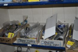 *Contents of Shelf to Include Brake and Clutch Levers, etc.