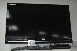 *Sharp 40” TV with Remote, DVD Player, and Stand