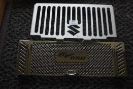 *Two Assorted Suzuki Radiator Protectors